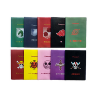 Collection of colorful passport holders with various designs on a white background